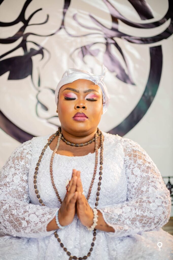 Spiritual practitioner in prayer at Soul Travel Ghana
